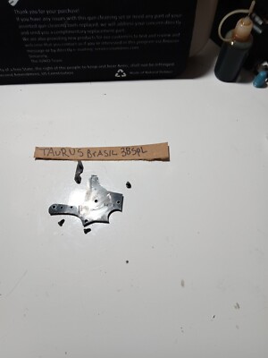 TAURUS BrasIL3 8 S P L, SIDE PLATE . HAND & SCREWS O E M