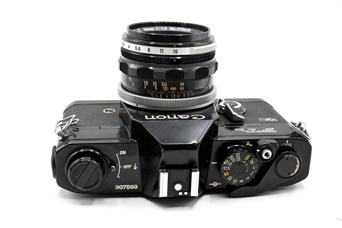 Black Canon FTb-QL 35mm SLR Camera with 50mm f/1.8 FL Lens Black Canon FTb-QL 35mm SLR Camera with 50mm f/1.8 FL Lens
