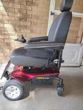 Red Jazzy Elite ES Power Wheelchair Charger included
