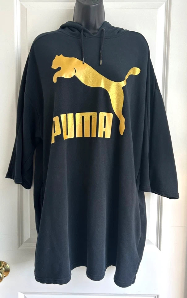 VESTIDO CON CAPUCHA PUMA GLAM OVERSIZE XL Negro con Logo Metálico Dorado Deportivo Informal Foto 3 de 4