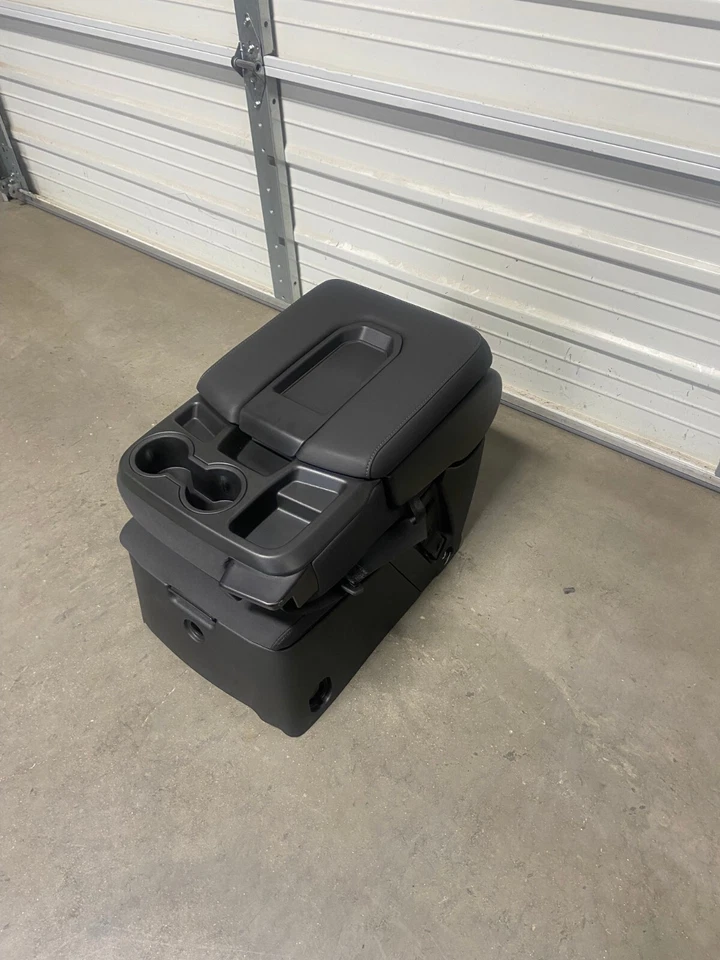 Chevrolet Silverado GMC Sierra Tahoe 2019 2025 consola central asiento de salto almacenamiento Foto 2 de 4