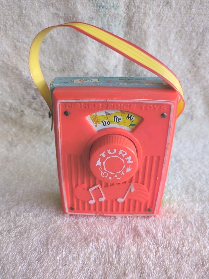 A 1969 Fisher-Price wind-up pocket radio that still works — one of the most nostalgic children's toys ever made, and a perfect retro desk trinket.
