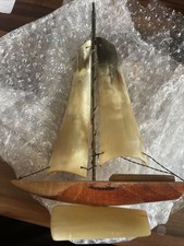 Handmade Sailboat Model Ornament With Horn-Style Sails and Wooden Hull