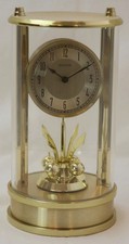 Bulova Gold  Mantel Clock with Rotating Pendu...