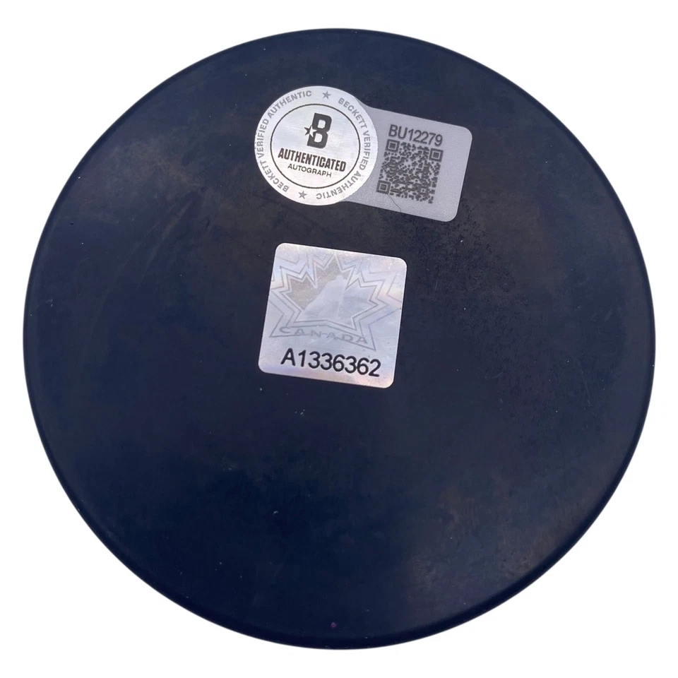 Disco de hockey firmado por Patrice Bergeron equipo Canadá logotipo Beckett Boston Bruins Foto 2 de 2