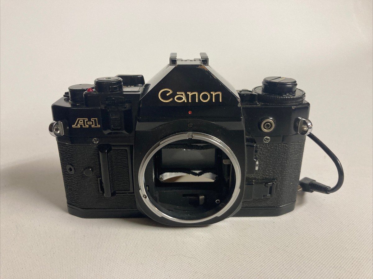 Vintage Canon A-1 35mm SLR Film Camera with Canon Data Back Vintage Canon A-1 35mm SLR Film Camera with Canon Data Back