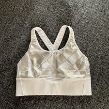Women s small Under Armour white with gold design sports bra