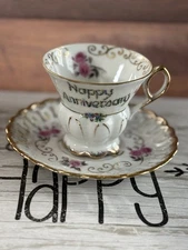 HAPPY ANNIVERSARY CUP AND SAUCER SET VINTAGE 105/94 WHT WITH PINK ROSE/GOLD TRIM