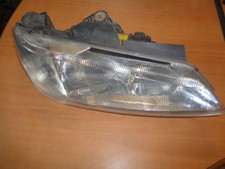phare avant d'occasion de Peugeot 406 phase 1 coté passager Bosch (réf 5964 )
