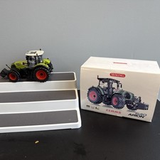 26)). Wiking Claas Arion 640 con caricatore frontale 1:32
