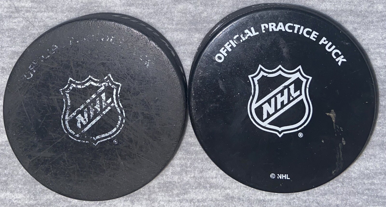 The Official Detroit Red Wings Practice Hockey Pucks Pair Of 2 NHL