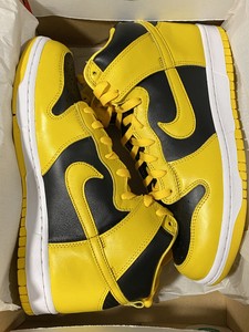 black varsity maize on feet