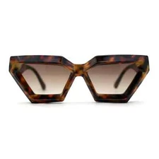 Sunglasses in the shape of a geometric trapezoid in a bold Modern Cat Eye style