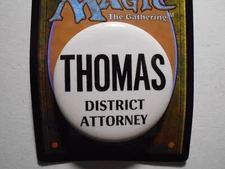 1-3/4" Thomas District Attorney Unknown location cello pinback button