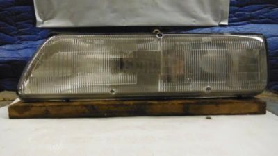 89 90 91 92 SUNBIRD R. HEADLIGHT W/O CONCEALED HEADLAMPS W/BLACK TRIM 24044