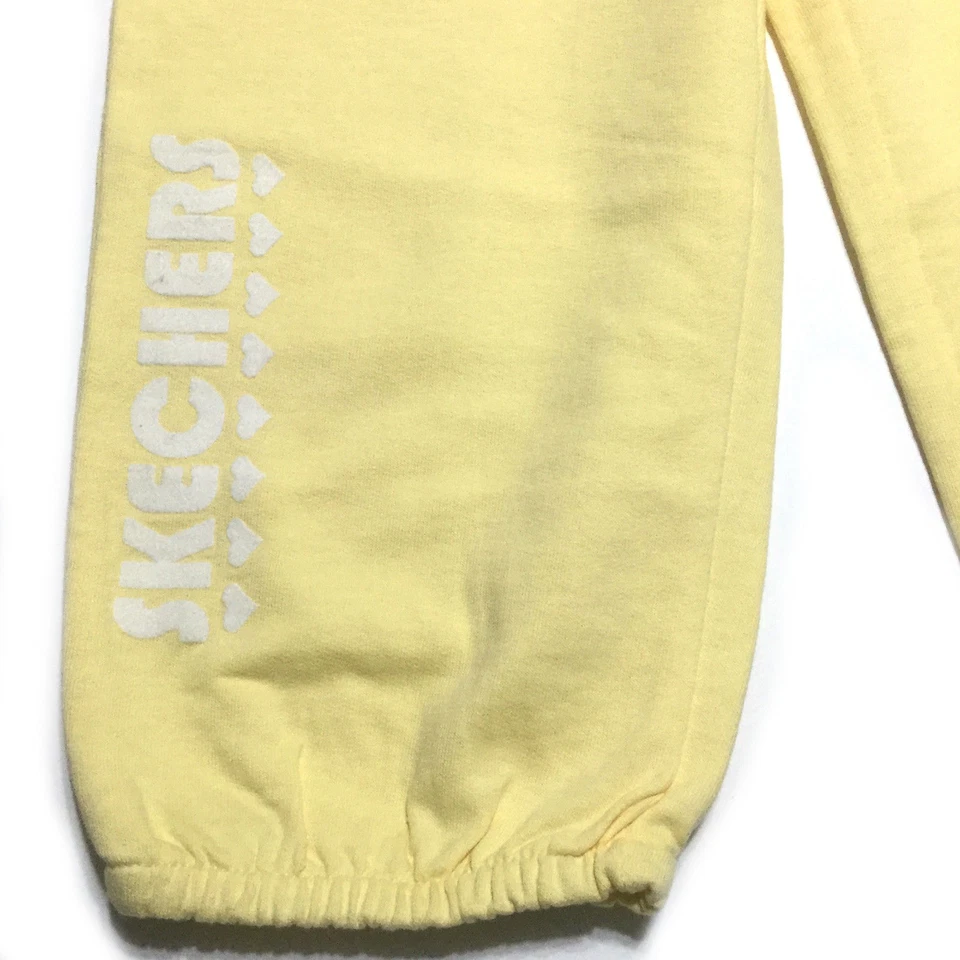 Pantalones deportivos Skechers para niñas talla 6 y 6X adornados ropa de juego algodón amarillo Foto 3 de 4