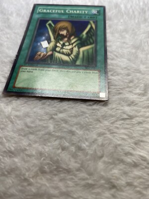 disgraceful charity yugioh card Yu-Gi-Oh! - Graceful (SDP-040) - Starter Deck Pegasus - Unlimited Edition Normal Spell Rarity Graceful Charity , One of