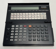 Vintage Casio FX 795 P Personal Handheld Computer PARTS/REPAIR ONLY -NON WORKING