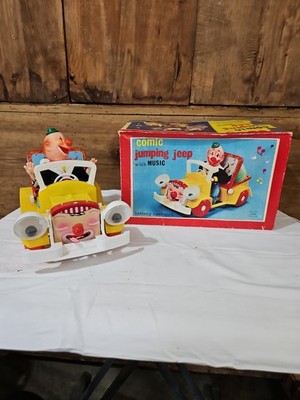 VTG NOS COMIC JUMPING JEEP WITH MUSIC BATTERY TOY ALPS JAPAN BOXED 1968