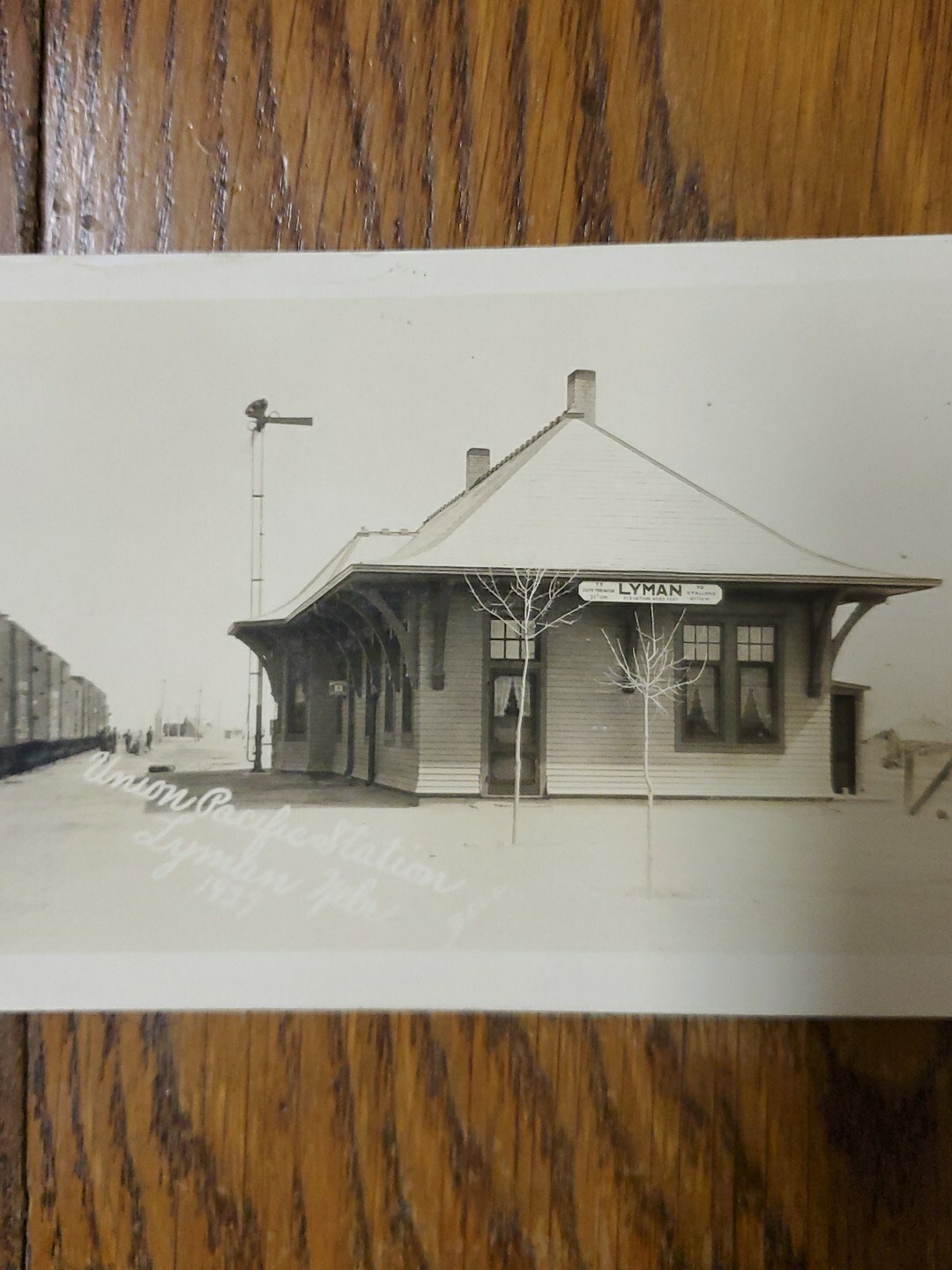 RPPC Postcard LYMAN, NEBRASKA RAILROAD DEPOT 1927 Union Pacific Train