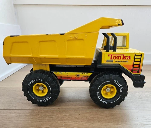 Vintage turboTonka XMB-975 Metal Dump Truck Yellow Turbo Diesel.