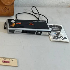 MINOLTA POCKET AUTOPAK 460Tx TELEPHOTO FILM CAMERA