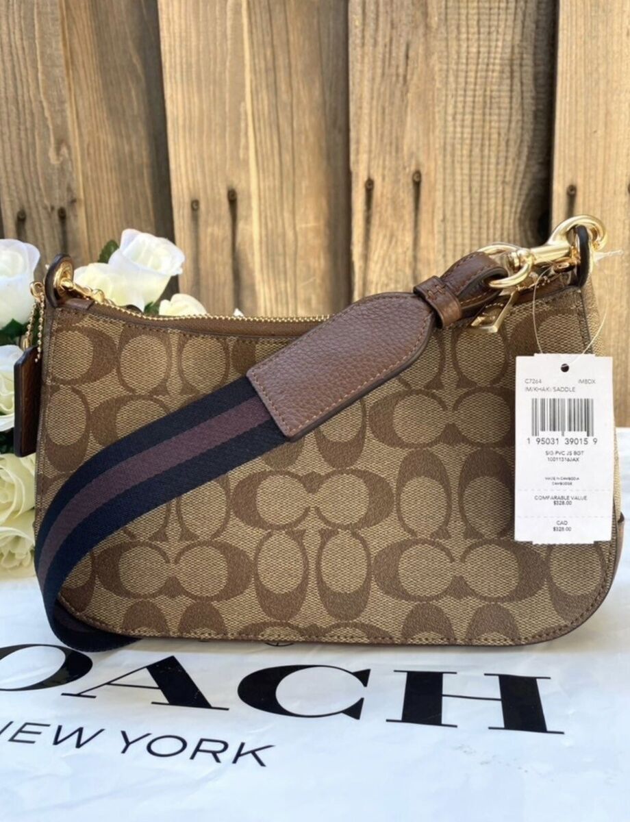 NWT COACH JES BAGUETTE IN SIGNATURE CANVAS crossbody bag NWT COACH JES BAGUETTE IN SIGNATURE CANVAS crossbody bag