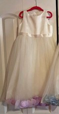 David  s Bridal flower girl dress ivory with lilac petals on the bottom