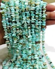 Natural peruvian opal uncut chip beads size 6 to 8mm strand 34 iches long .