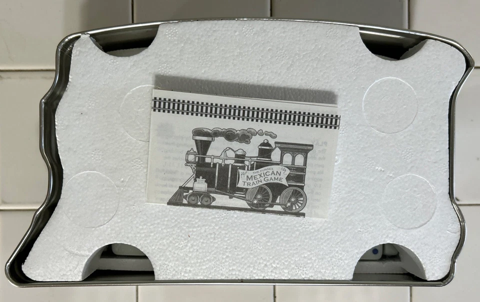 Juego de dominó The Fundex Mexican Train nuevo en caja metálica lata vintage 2002 Foto 3 de 4