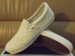 ivory slip on vans