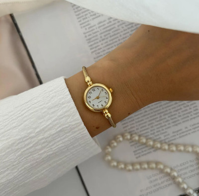 Vintage Damen Armbanduhr vergoldet gelbgold rundes Zifferblatt minimal