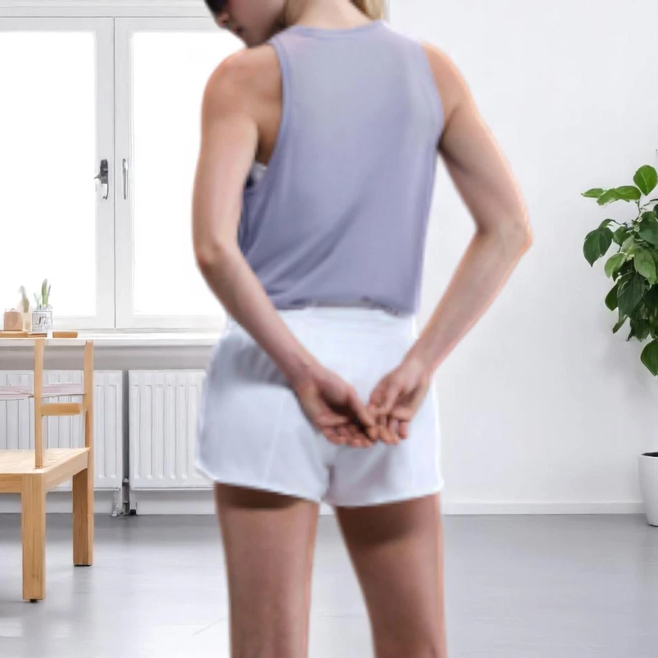 Nuevo Camiseta sin mangas Nike Dri-FIT Entrenamiento para mujer DX0701 púrpura orquídea Foto 3 de 4