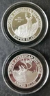 Two North American Hunting Club 1oz Silver Ungulate Rounds in Capsules
