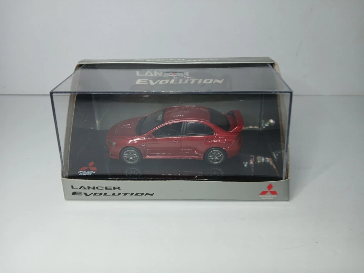 Modellino Auto Welly Mitsubishi Lancer Evo X Blu – Scala 1/34 Con Porte Apribili