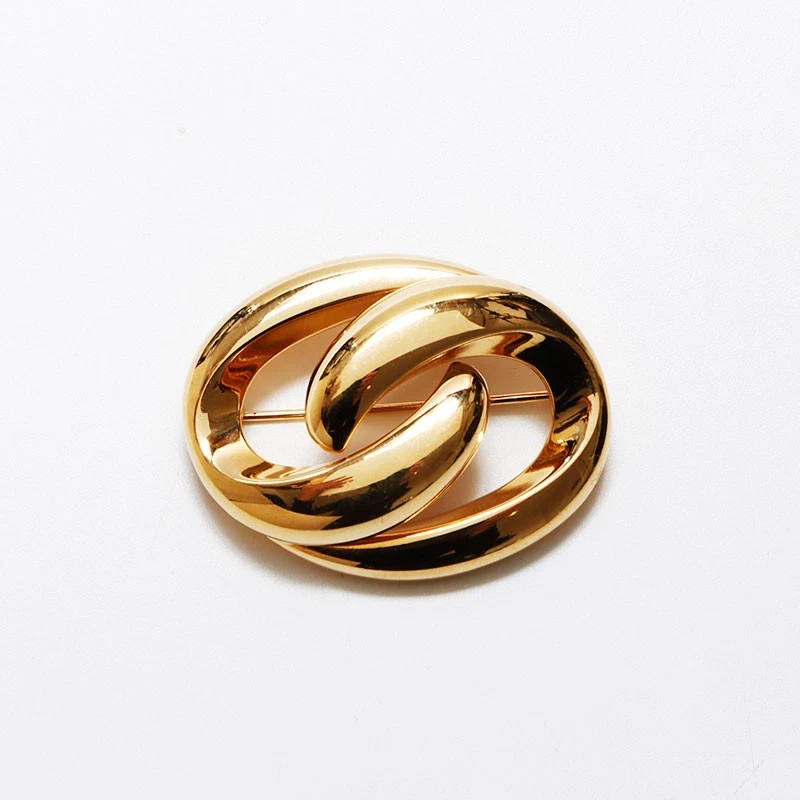 Broche ronde dorée Christian Dior WS12582 occasion, bijou élégant