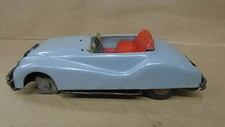 Vintage tin friction 1955 jaguar convertible toy car made in japan