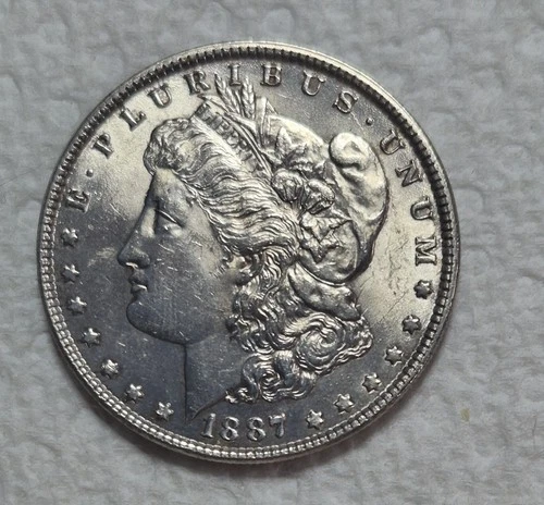 1887 P Morgan Silver Dollar. Estimated Uncirculated Mint State 63/4. Video A0292