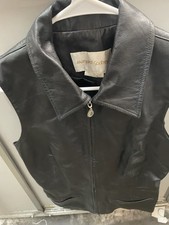 vintage black leather vest designed by Margaret Godfrey