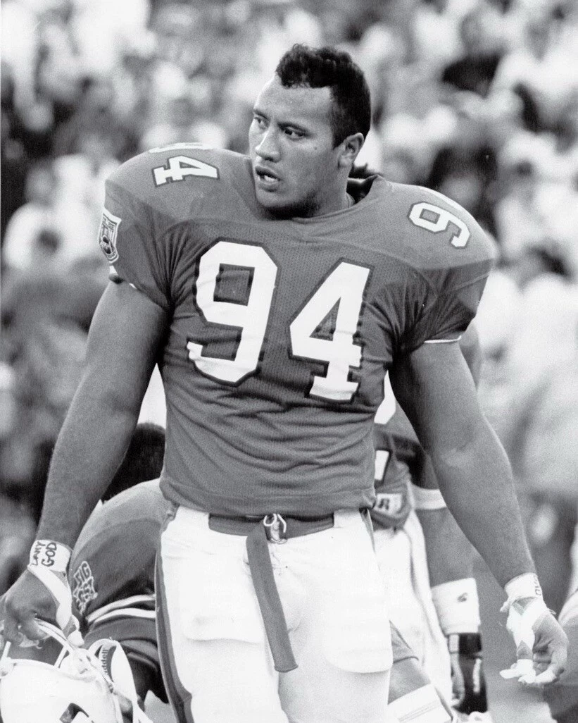 Did the rock play football outlet