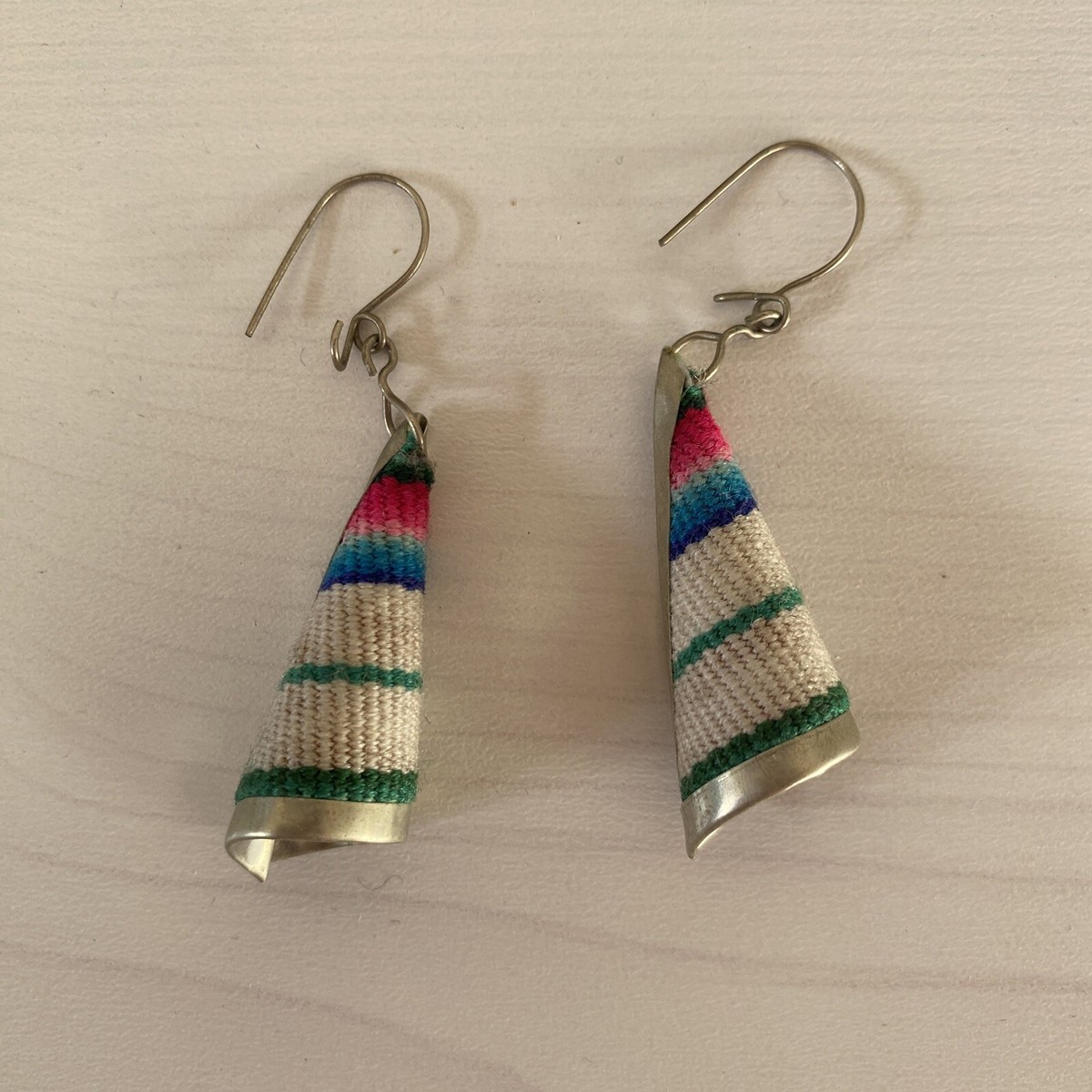 Peruvian indigenous hand woven fabric with silver frame cone