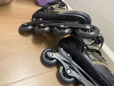 Size 9, Black And Yellow Rollerblades