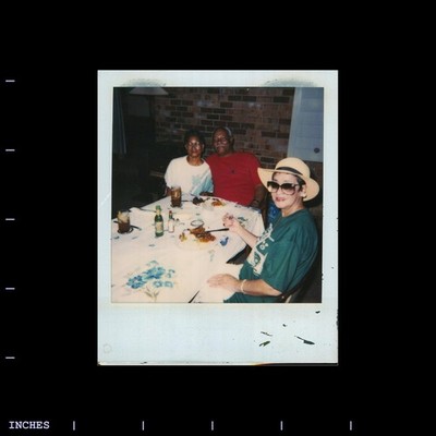 Old Polaroid Photo MAN WOMEN SITTING AROUND TABLE