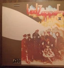 Led Zeppelin two Japanese pressing near mint condition with insert and rare post