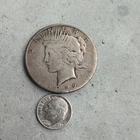 1922 $1 Peace Silver Dollar and silver dime 1963