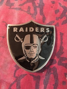 raiders belt buckle
