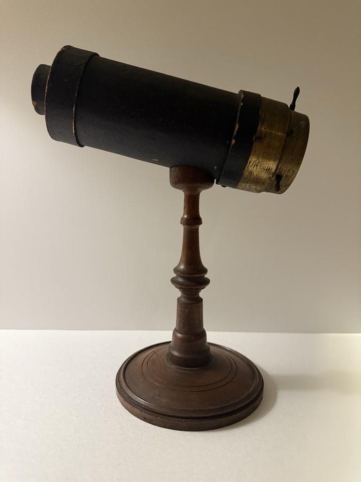 A genuine C.G. Bush parlor kaleidoscope on its original wooden stand — Bush patented the teleidoscope in 1873 and these are the holy grail of kaleidoscope collecting.
