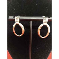 Silver Looking Oval Post Earings With Rhinestone At The Top Of Oval Piece.