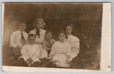 RPPC Victorian Children on Lawn Dresses Bows Bonnet Postcard D27