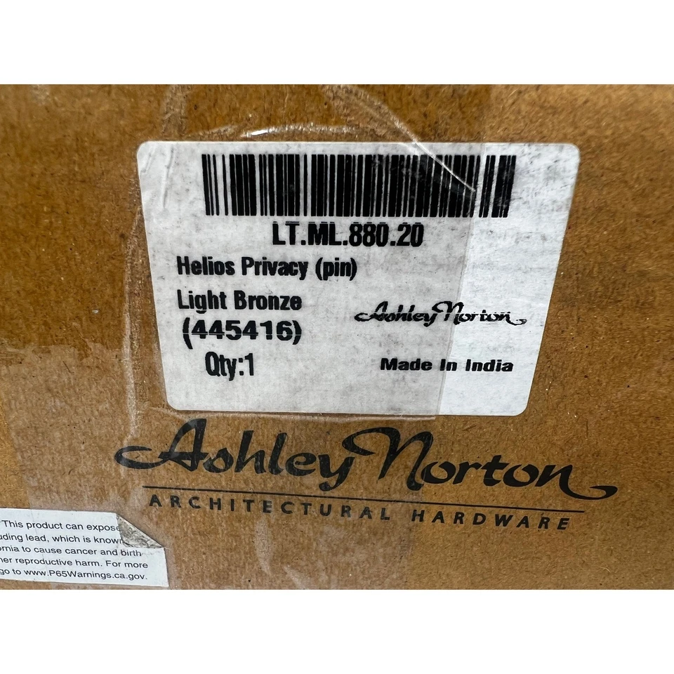 Juego de perillas de puerta de bronce con luz de privacidad Ashley Norton Helios herrajes arquitectónicos Foto 3 de 4